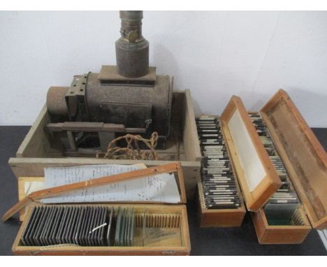 A magic lantern projector along with three cases of photographic slides and stereoscopic views of Jerusalem