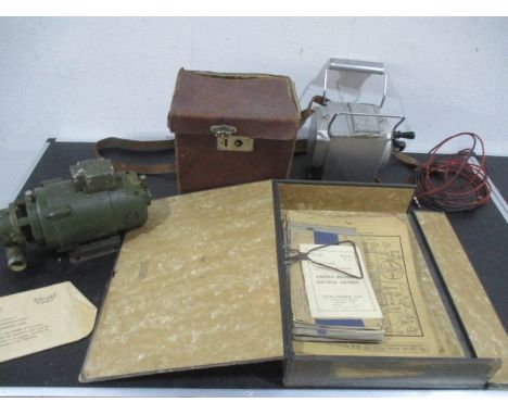 A Stuart water pump along with a 25 v Bridge Megger and Lucas diagrams for Motor car and motorcycles