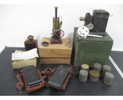 A Bing vertical steam engine ( A/F) along with vintage cameras, darkroom lamp, projector etc.