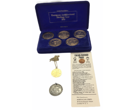 A cased set of European Architectural heritage medallions along with a silver gilt medallion, Victorian Taunton medallion etc