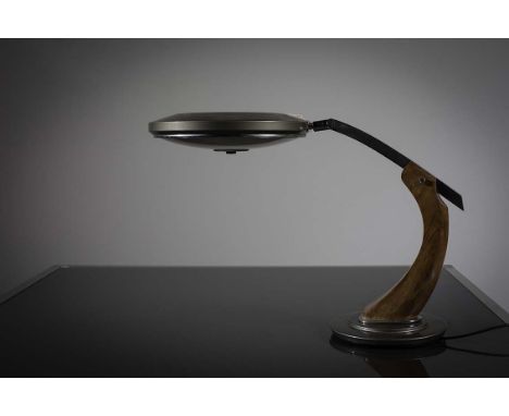 A 1960s DESK LAMP, BY FASE, on a swivel base, 40cm (h)