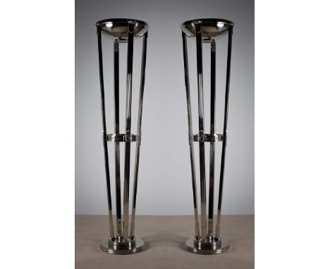 A PAIR OF CHROME ART DECO STYLE UPLIGHTERS, BY EICHOLTZ, on circular bases, each 202cm high