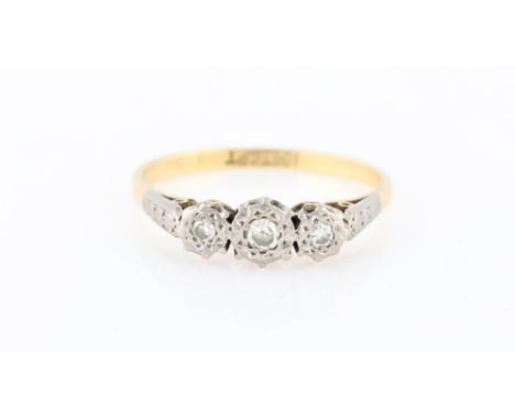 A three stone diamond ring, set with three graduated eight cut diamonds, total diamond weight approx. 0.15ct, stamped 18ct&am
