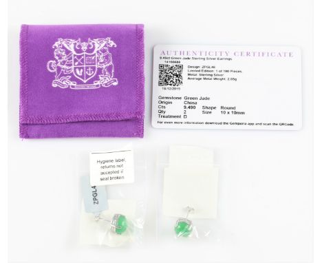 A pair of dyed jade stud earrings, each set with a circular dyed green jade cabochon, stamped 925.