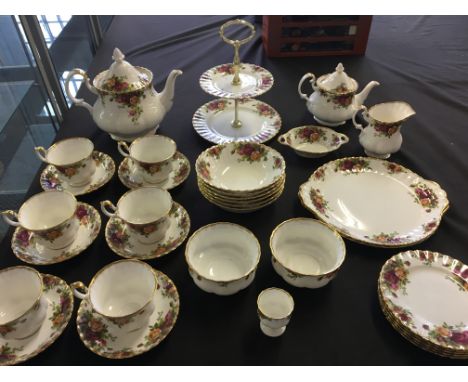A Royal Albert Old Country Roses tea service including approximately thirty four pieces, tea cups and saucers, tea and coffee