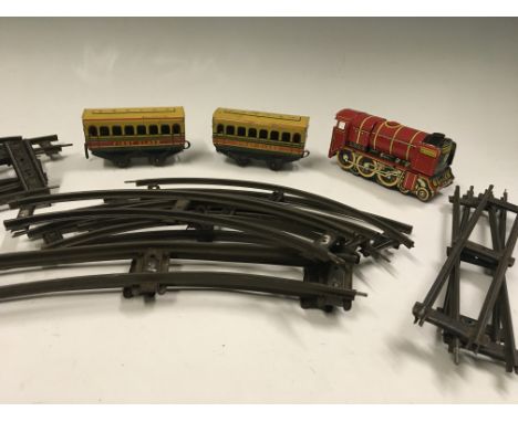 A Brimtoy clockwork train set.