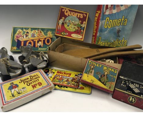 A selection of various toys and games including Davies Pacemaker roller skates, Jokari set, Cometa Paracadista, Quoits, John 