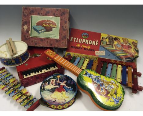 Various musical toys, including a Chinese red painted 12 key baby piano No. WG 015, in box, with The Family Melody Maker xylo