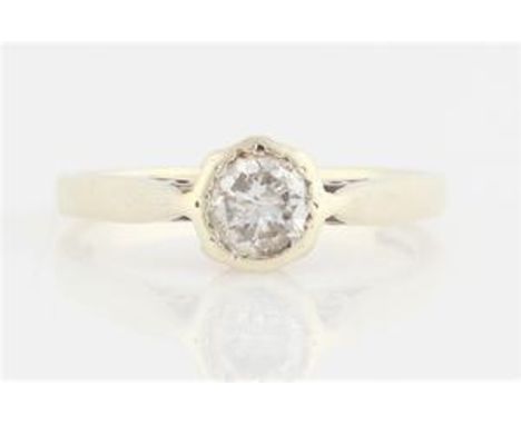 A diamond solitaire ring, bezel set with a round brilliant cut diamond, measuring approx. 0.50ct, indistinctly stamped, ring 