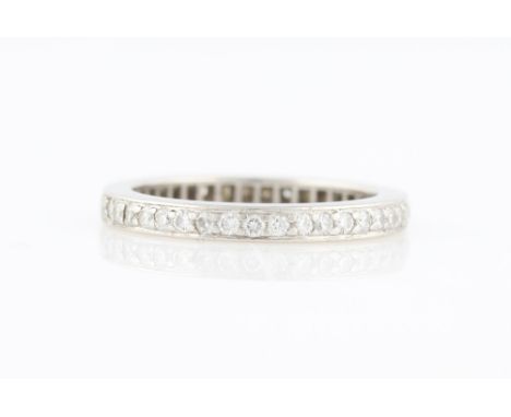 A diamond full eternity ring, set with round brilliant cut diamonds, each measuring approx. 0.01ct, total diamond weight appr