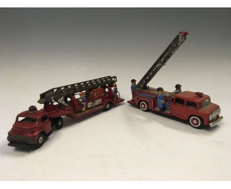 Two tinplate fire engines, one M.F.D made in Japan, one friction with siren and extending ladder.