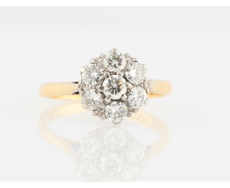 An 18ct yellow gold diamond cluster ring, set with seven round brilliant cut diamonds, total diamond weight approx. 1.20ct, h