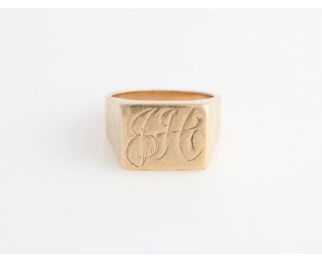 A gents signet ring, the rectangular head engraved with monogram, unmarked yellow metal, ring size Q½.
