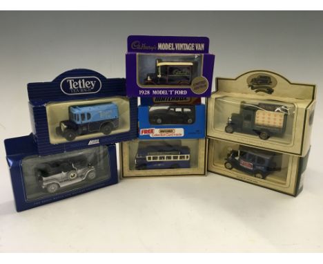 A box of model vehicles including Lledo Tetley and Days Gone, Matchbox, etc, with seven Eddie Stobbart model lorries.