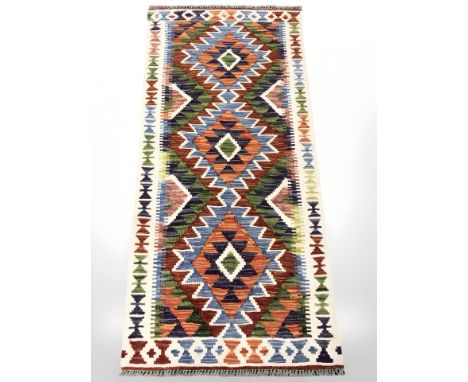 A Chobi Kilim runner, 142 cm x 68 cm 
