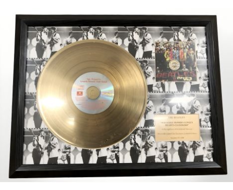 A The Beatles Sgt. Pepper's Lonely Hearts Club Band 24 ct gold coated vinyl disc, limited edition numbered 237 of 1500, in fr