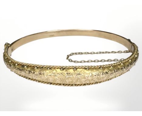 A 9ct gold hinged bangle CONDITION REPORT: 7.7g