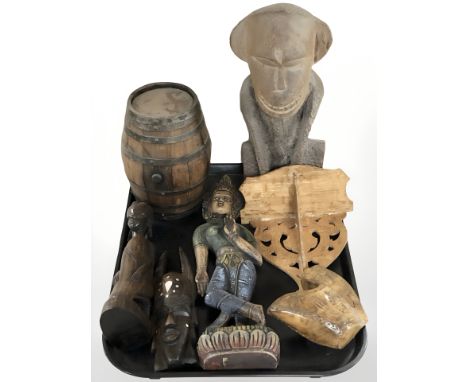 A group of eastern wooden carvings, figures, wall shelf, miniature barrel, etc. 