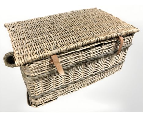 A wicker hamper, width 80 cm.