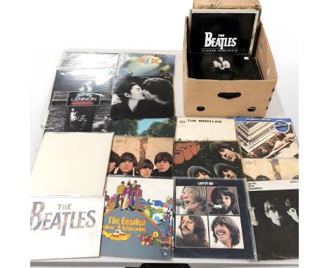 Approximately sixty-two vinyl LP records and box sets including The Beatles, John Lennon, Julian Lennon, George Harrison, Lin