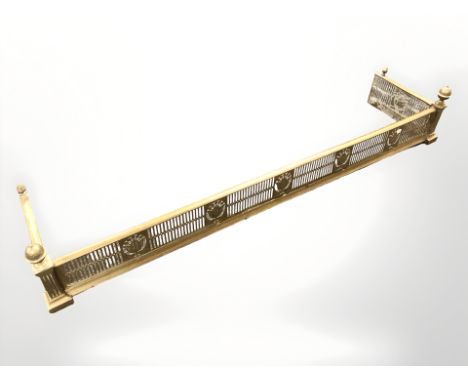 A late Victorian pierced brass fender, width 144 cm 