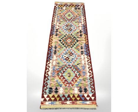 A Chobi Kilim runner, 204 cm x 70 cm 