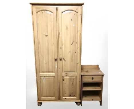 A modern pine double door wardrobe and a bedside cabinet 