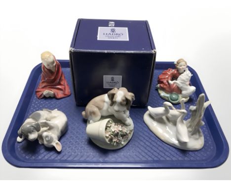 A Lladro Collector's Society figure 'It Wasn't Me' No. 7672, with box, a Nao group of geese, Royal Copenhagen figure of two p