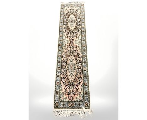 A Tabriz-design runner, 188cm by 47cm