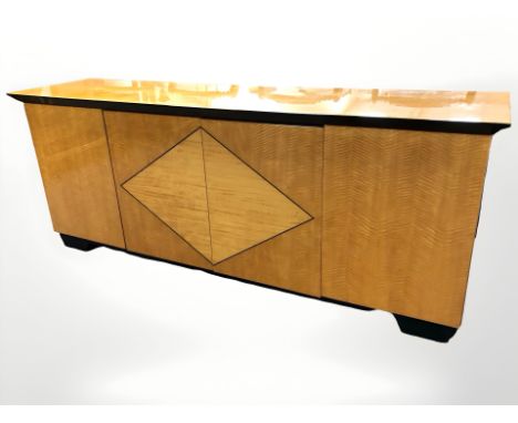 An Art Deco style lacquered sideboard, 200 cm L x 50 cm D x 80 cm H.