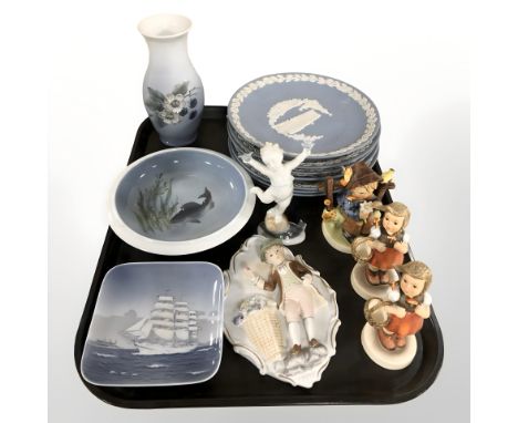 A group of Wedgwood jasperware plates, Royal Copenhagen shallow dishes and vase, Goebel figures, etc.