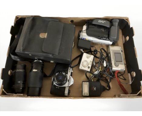 A Pentax KX camera, JVC video camera, lenses, etc. (1 box)