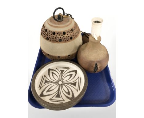 A Scandinavian earthenware lamp base, pendant light fitting and a shallow dish.