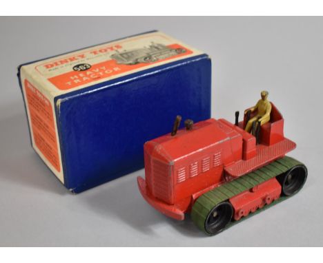 A Boxed Dinky Toys 563 Heavy Tractor in Red with Green Caterpillars. Model G Box VG 