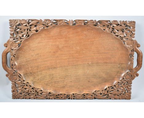An Ornately Carved Far Eastern Rectangular Two Handled Drinks Tray with Foliate Decoration, 60cm wide 