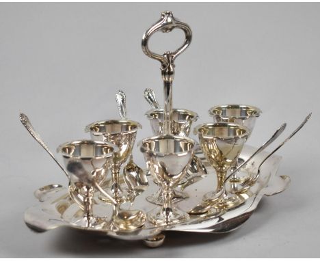 An Edwardian Silver Plated Boiled Egg Cruet for Six, with Spoons on Oval Tray, 27cm wide 