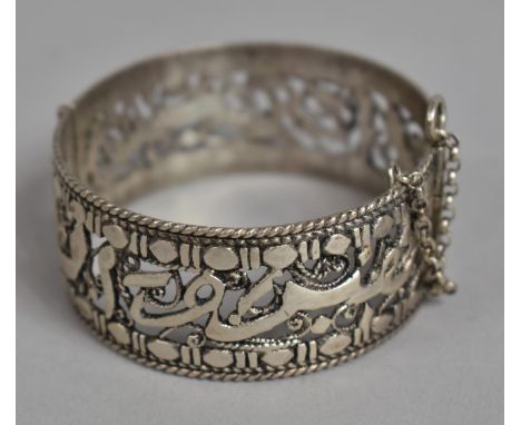 A Pierced Arabic White Metal Bangle 