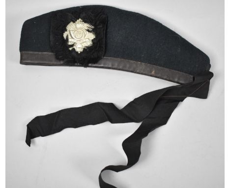 A Scottish Military Beret with Badge for the British Highland Light Infantry 