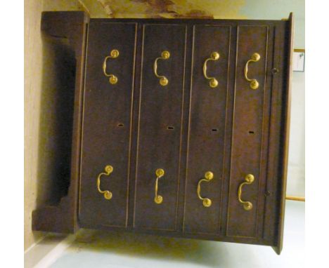 A George III mahogany dressing chest, having a brushing slide with green baise surface, over four graduated long drawers with