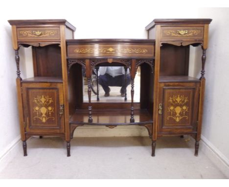 An Edwardian satinwood string inlaid and marquetry rosewood sideboard, having a drop-well centre, over a spindle pillared, bo