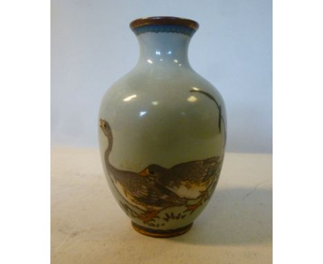 A Japanese Meiji period cloisonne miniature vase of baluster form, having a flared neck, decorated with two geese and foliage