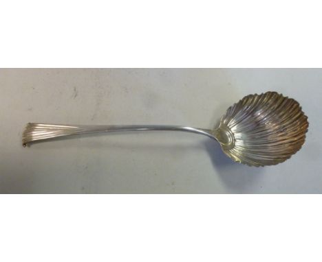 A George III silver Onslow pattern ladle with a shell design bowl  indistinct marks  