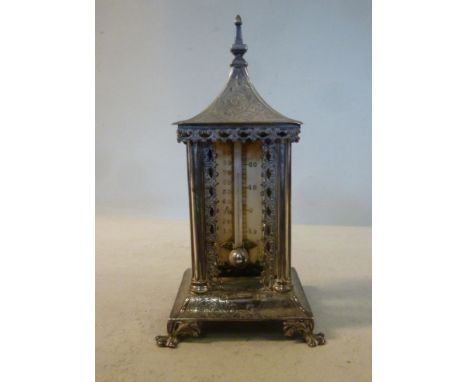 A Victorian thermometer, on an ivory backplate, set in a silver bandstand design case with a pagoda top and foliate engraved 