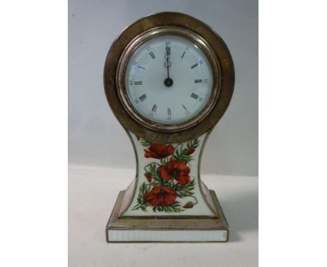 An Edwardian silver balloon cased mantel timepiece, the front panel decorated with red and white engine turned enamelled deco