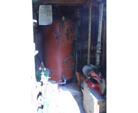The contents of an engineer's boiler room: to include a J Hatton horizontal stationary steam engine; a Goodebrande horizontal