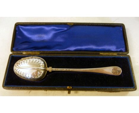 A Victorian silver Old English pattern tea infuser spoon having a pierced bowl and hinged cover with screw lock  George Gray 