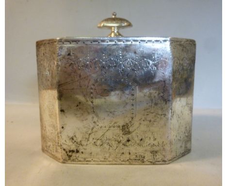 A late Victorian silver tea caddy of octagonal form with a hinged lid, decorated with engraved husk ornament  John, Edward, W