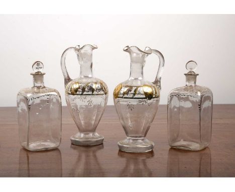 Pair of square glass spirit decanters and a pair of glass claret jugs 19th Century, the square glass decanters with gilt pain