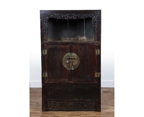 Stained wood cupboardChinese, early 20th Century, with open top with carved surround and with cupboards below, 107cm wide, 51