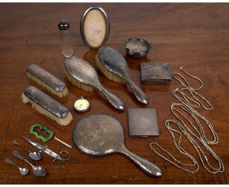 Group of miscellaneous silvercomprising of: silver backed dressing table brushes, spoons, oval photo frame, cigarette case, a